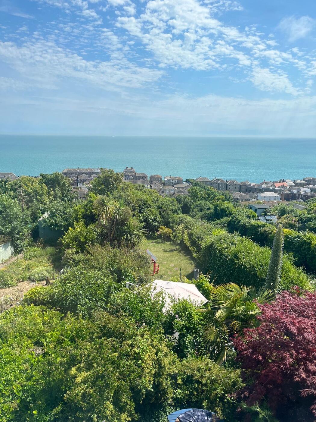 Ventnor seen from above, terraced houses descending towards the sea on the Isle of Wight